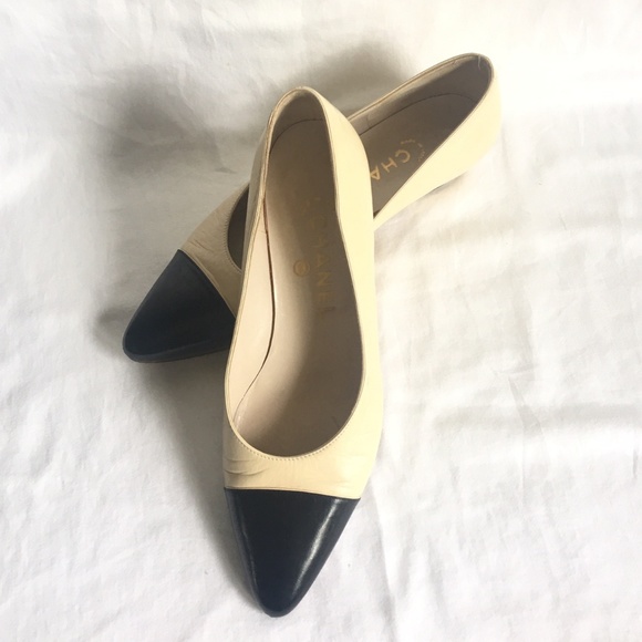 chanel cream and black shoes
